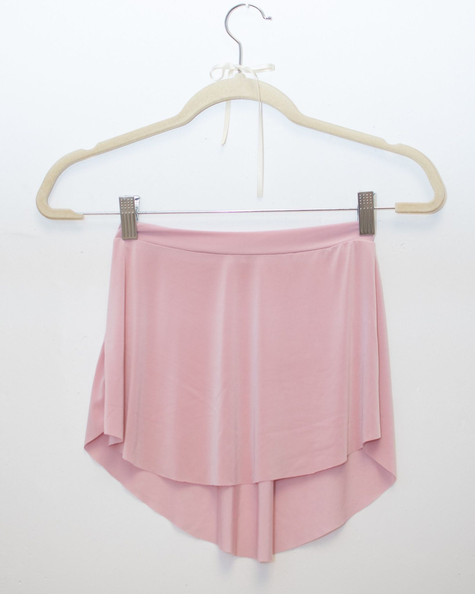 Pollerín de danza color rosa, indumentaria de danza liviana para ballet y entrenamiento